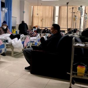 Japan to tighten border restrictions for travelers from China as COVID spreads