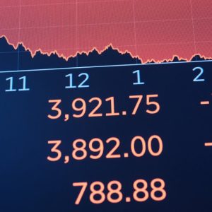 Stocks plunge after interest rates rise and retail spending falls