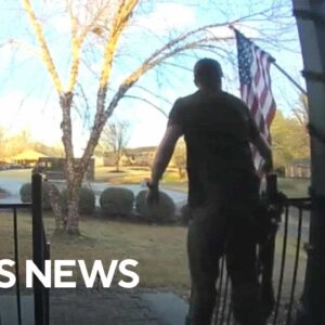 UPS driver stops to fix family's tangled American flag