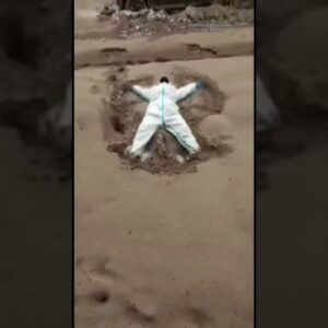 Woman makes ash angel after volcano erupts #shorts