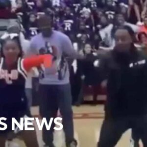 Dad performs cheerleader daughter's dance routine