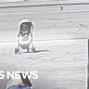 Good Samaritan stops baby stroller before rolling toward busy traffic in California