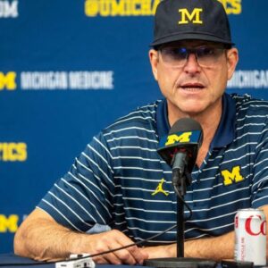 University of Michigan football head coach suspended