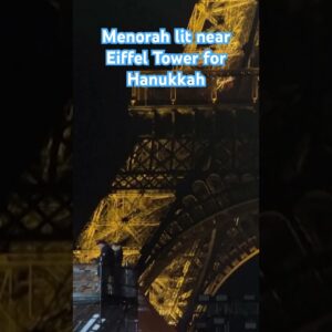 Members of Paris’ Jewish community celebrated the 4th day of Hanukkah near the Eiffel Tower #shorts