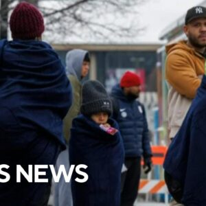 Cities struggle to shelter migrants in freezing temperatures