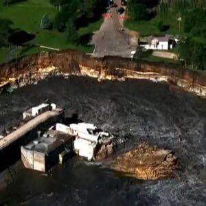 Side of Minnesota's Rapidan Dam eroded by raging floodwaters
