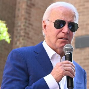 Biden tells congressional Democrats he's "firmly committed" to staying in race