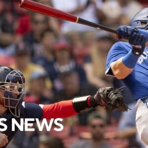 Baseball fans watch history unfold