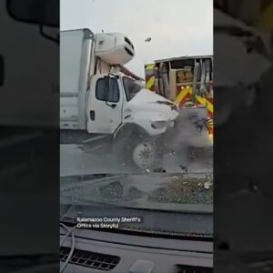 Semi-truck slams into firetruck assisting a separate accident in Michigan #shorts