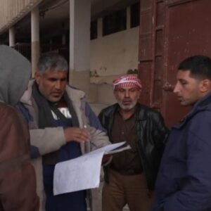 Syrians search for loved ones at notorious prison after Assad regime's downfall