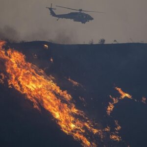 Crews around Los Angeles battling new wildfires, Trump threatening to withhold aid
