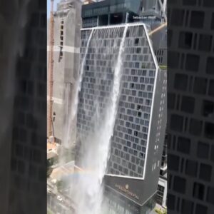 Water from rooftop pool cascades down Bangkok hotel during 7.7 earthquake #shorts