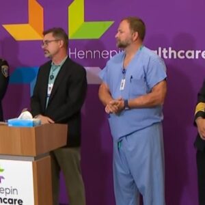 Student shielding younger child took hit during school shooting, health official says