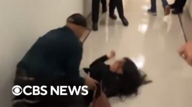 ICE officer returns to duty after being caught on video pushing woman to ground