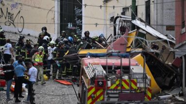 Lisbon's funicular streetcar derails, killing at least 15