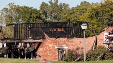 Shooter rammed truck into church, opened fire and set massive blaze, officials say