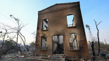 Wildfires spread in historic California town