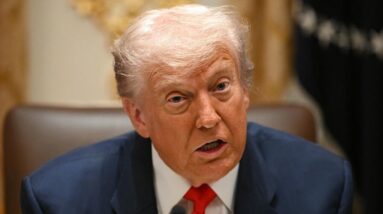 Trump accuses China of "purposefully not buying" U.S. soybeans, threatens trade retaliation