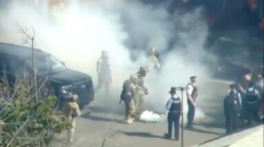 Federal agents use tear gas on Chicago crowds, undercutting temporary restraining order